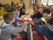 Washougal: First- and fourth-graders at Hathaway Elementary School were treated to a party after raising funds for the Leukemia and Lymphoma Society Pennies for Patients campaign. Ace King, from left, Eduardo Herrera, Connor Hamilton, Mikinlee Gerke, Ruby Burns, Ryder Noce, Ilyas Moskvin and Daniel Gambo-Rose toast with their root beer floats.