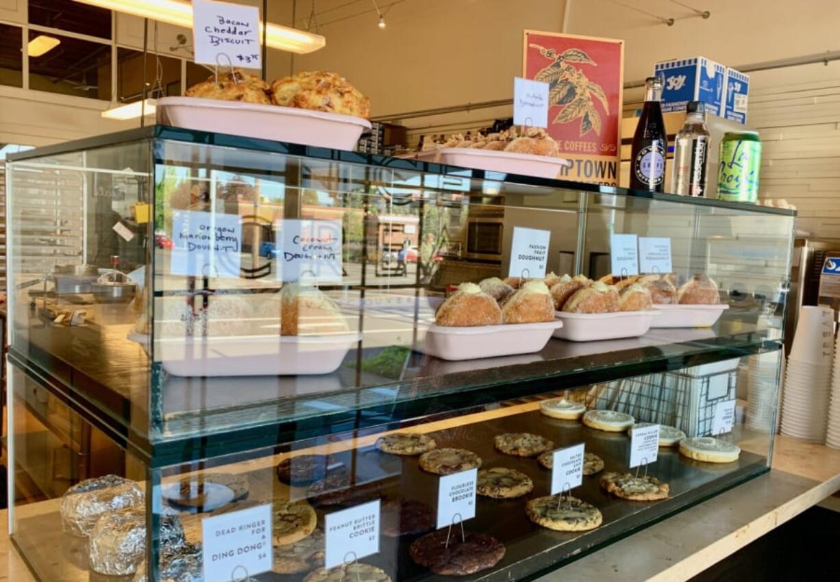 A glass case at Treat Bakery holds downtown Vancouver’s doughnut oasis.