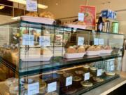 A glass case at Treat Bakery holds downtown Vancouver’s doughnut oasis.