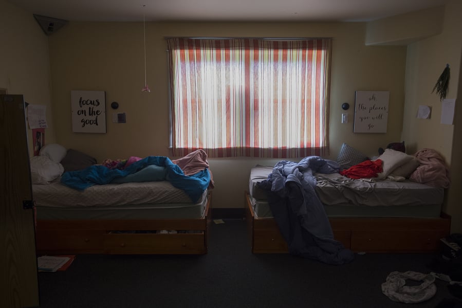 Inspirational messages are seen posted on the wall in a girls wing bedroom at Daybreak Youth Services in Brush Prairie in 2019.