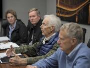 Friends of Vancouver Lake members Kathy Gillespie, from left, Ted Gathe, Larry Cassidy and Jim Luce gather Wednesday to talk about challenges facing the lake with The Columbian’s Editorial Board.