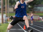 Ridgefield’s Nick Jenkins won the 2A district triple jump title on Friday with a leap of 46 feet, 6 inches.