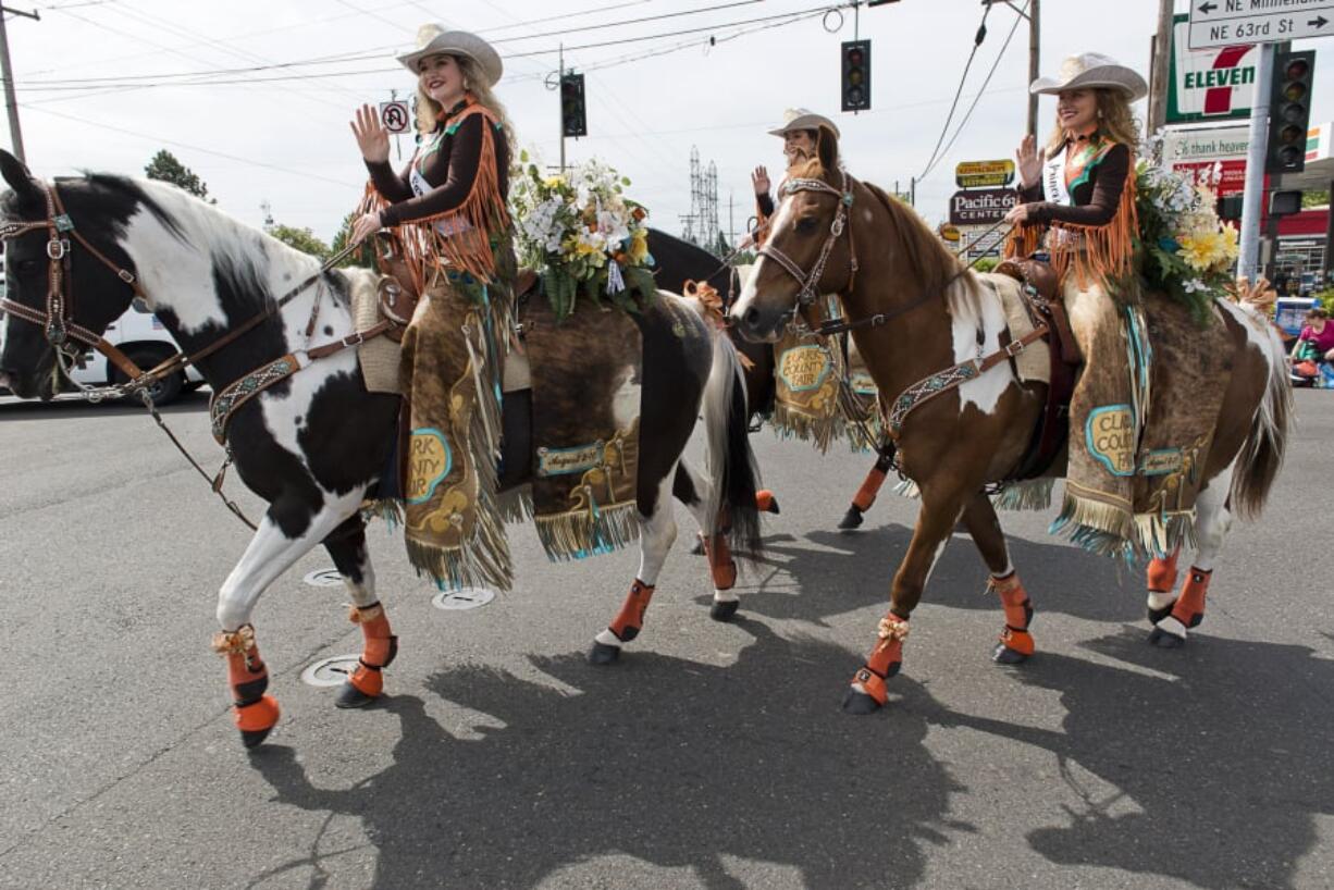 The Clark County Fair Queen and Princesses participate in the Hazel Dell Parade of Bands on Saturday.