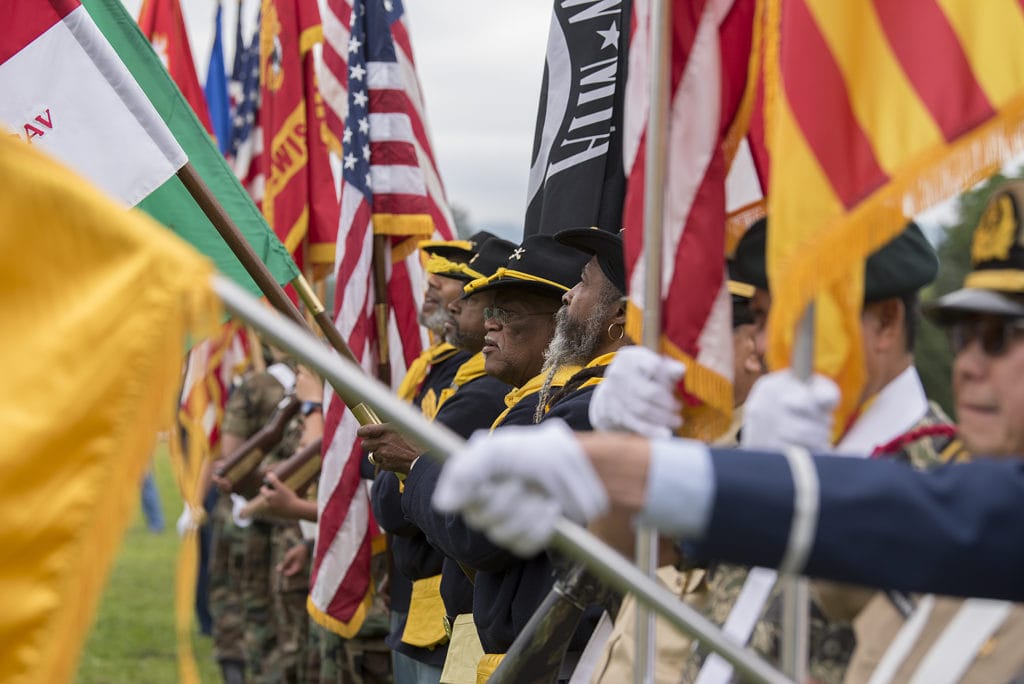 An honor guard made of multiple branches of the military practices posting the colors before the 2019 Memorial Day service at Fort Vancouver National Historic Site on Monday morning, May 27, 2019.