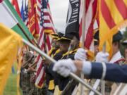 An honor guard made of multiple branches of the military practices posting the colors before the 2019 Memorial Day service at Fort Vancouver National Historic Site on Monday morning, May 27, 2019.