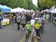 Customers crowd the Vancouver Farmers Market in 2019.