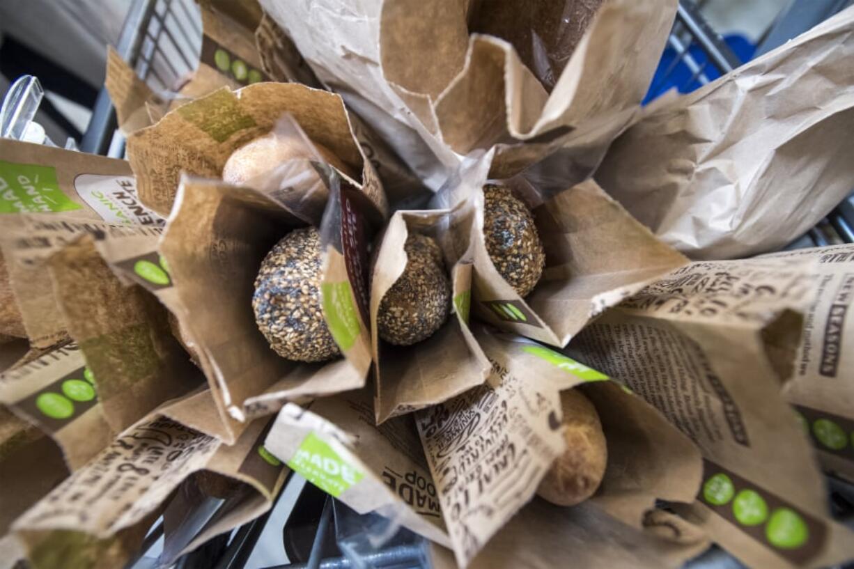 Bread that has been selected for donation sits in the back room at New Seasons Market in Vancouver. Food & Wine named New Seasons one of the 10 best supermarkets in the United States.