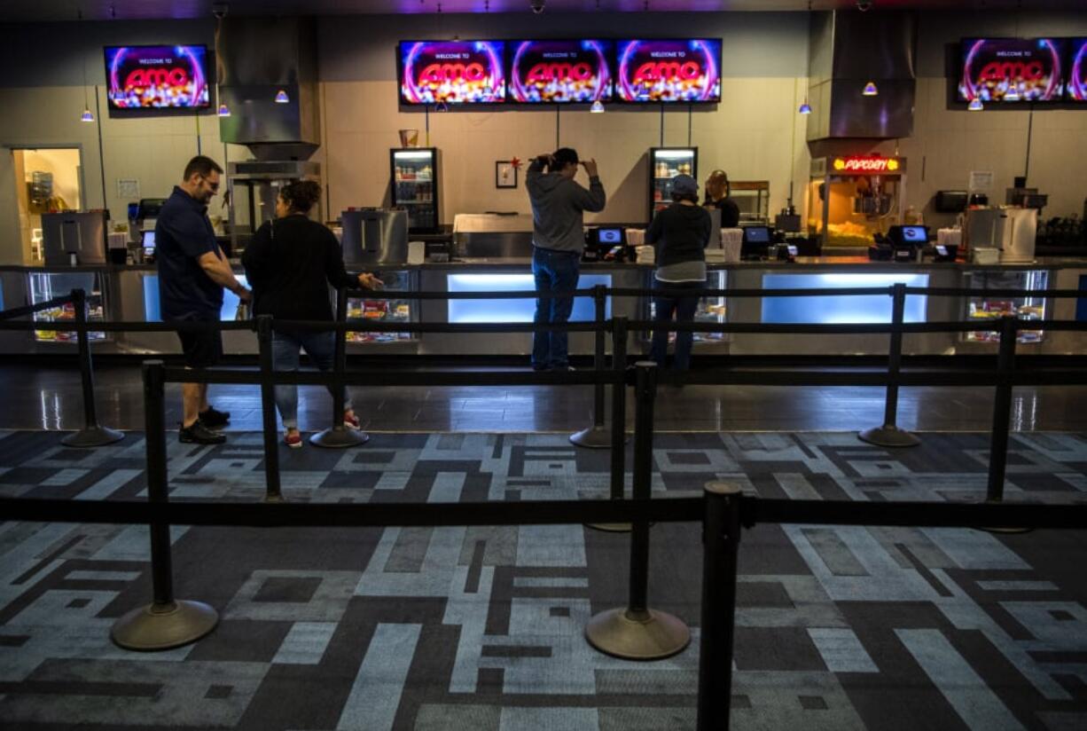 The former Cinetopia multiplex theater at the Vancouver Mall reopened Friday as AMC Vancouver Mall 23, one day after AMC announced that it had acquired the Cinetopia brand and its four locations.