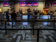 The former Cinetopia multiplex theater at the Vancouver Mall reopened Friday as AMC Vancouver Mall 23, one day after AMC announced that it had acquired the Cinetopia brand and its four locations.