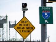 A metered ramp warning sign is posted just off of Washington Street at the beginning of the I-5 onramp before the Interstate 5 Bridge in Vancouver on Thursday, May 30, 2019.