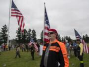 Camas resident Jerry Barbour, a member of the Patriot Guard Riders, stands at attention during the 2017 Memorial Day ceremony at the Fort Vancouver National Historic Site.