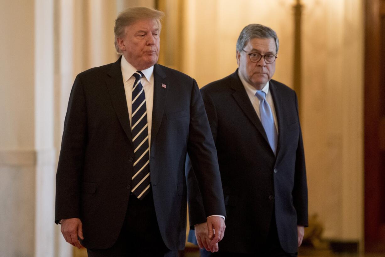 President Donald Trump and Attorney General William Barr arrive for a Public Safety Officer Medal of Valor presentation ceremony in the East Room of the White House in Washington, Wednesday, May 22, 2019.(AP Photo/Andrew Harnik)