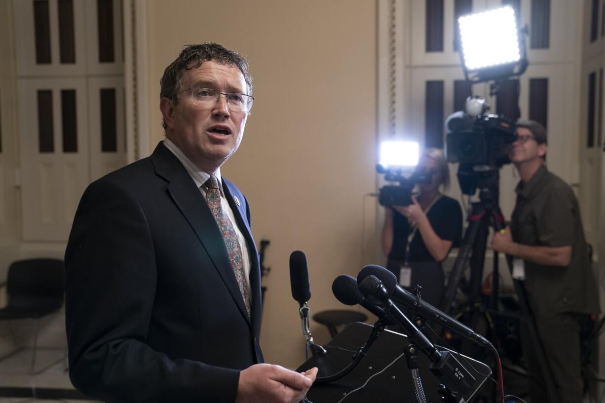 Rep. Thomas Massie, R-Ky., speaks to reporters at the Capitol after he blocked a unanimous consent vote on a long-awaited $19 billion disaster aid bill in the chamber on Tuesday, May 28, 2019. (AP Photo/J.