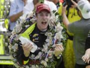 Simon Pagenaud, of France, celebrates after winning the Indianapolis 500 IndyCar auto race at Indianapolis Motor Speedway, Sunday, May 26, 2019, in Indianapolis.