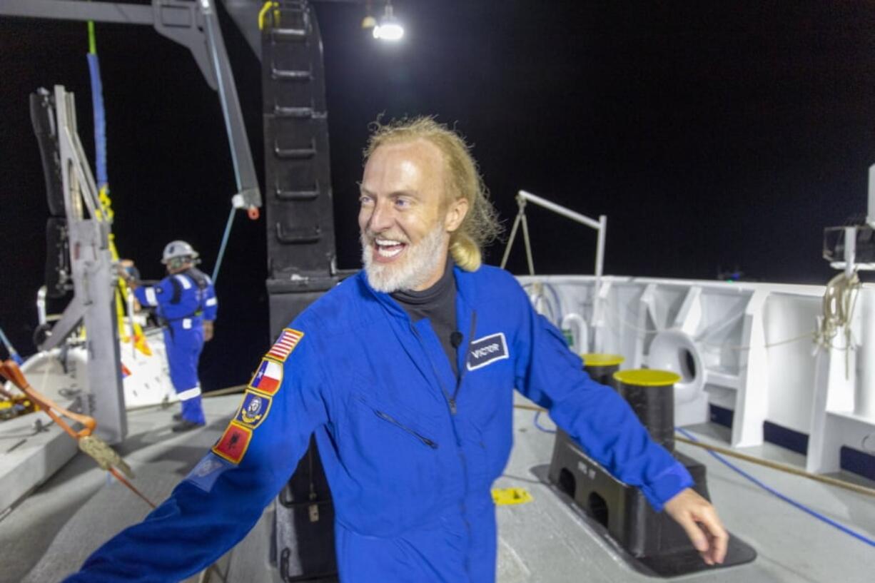 Victor Vescovo emerges from his submersible Limiting Factor after a successful dive to the deepest known point in the Mariana Trench on April 28. Vescovo, a businessman and amateur pilot, has also traversed the highest peaks of mountains, including Mount Everest.