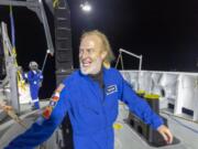 Victor Vescovo emerges from his submersible Limiting Factor after a successful dive to the deepest known point in the Mariana Trench on April 28. Vescovo, a businessman and amateur pilot, has also traversed the highest peaks of mountains, including Mount Everest.