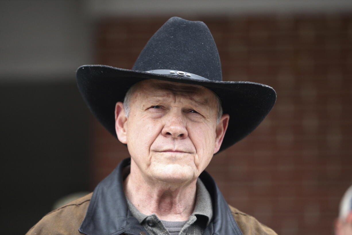 FILE - In this Dec. 12, 2017, file photo, Roy Moore speaks to the media after he rode in on a horse to vote in Gallant, Ala. Moore says he’s considering a fresh run for Senate in 2020. That’s prompting national Republican leaders to signal that they’d try again to prevent their party from nominating Moore, who’s denied long-ago sexual impropriety with teenagers.