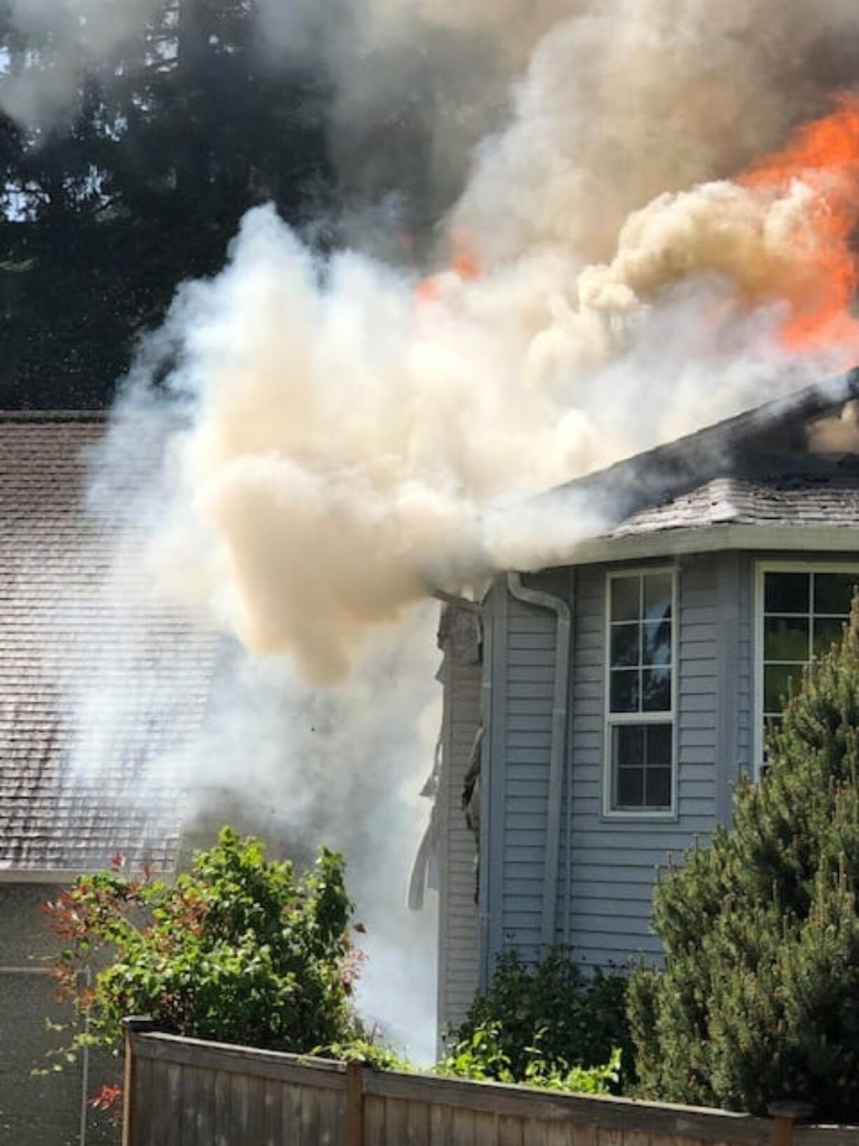 Clark County Fire District 6 responders competed against dry winds when battling a house fire Thursday afternoon in Hazel Dell.