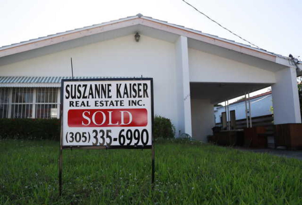 In this April 12, 2019, file photo, a sold sign is shown in front of a home in Surfside, Fla. On Tuesday, May 28, the Standard & Poor's/Case-Shiller 20-city home price index for March is released.