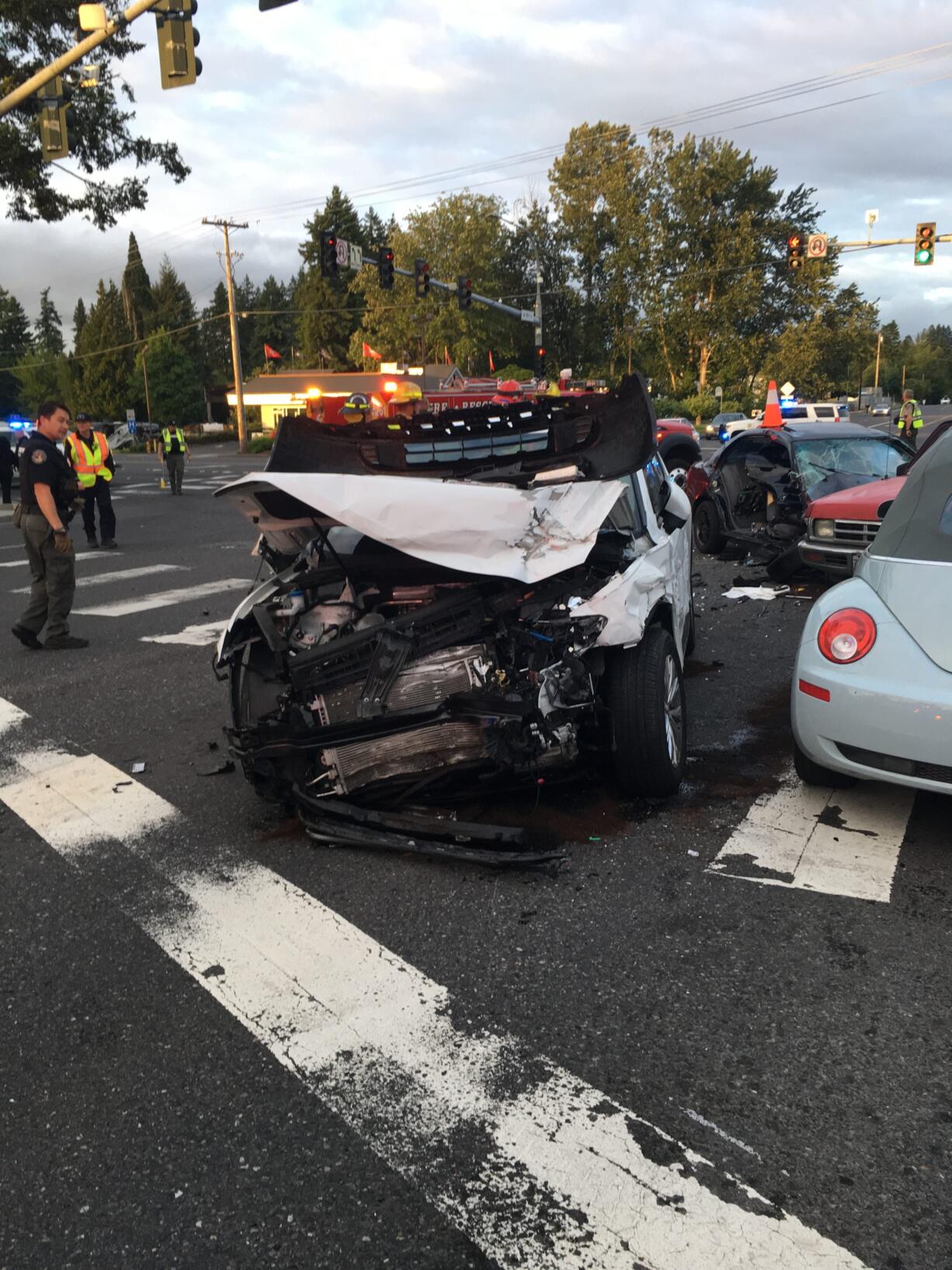 Occupants in three of four vehicles, involved in a collision Friday evening at the intersection of Northeast Highway 99 and Northeast 99th Street, suffered serious but not life-threatening injuries.