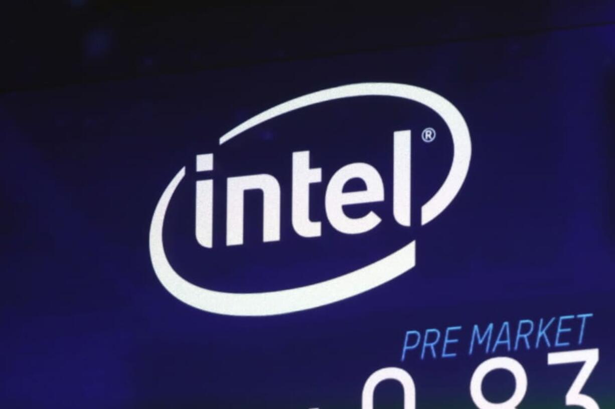 The Intel logo appears on a screen at the Nasdaq MarketSite in New York’s Times Square.