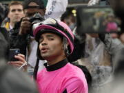 Luis Saez reacts after Maximum Security was disqualified from the 145th running of the Kentucky Derby horse race at Churchill Downs Saturday, May 4, 2019, in Louisville, Ky.