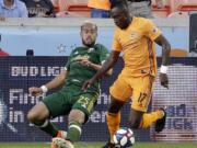 Portland Timbers defender Bill Tuiloma (25) tries to take the ball from Houston Dynamo forward Alberth Elis (17) during the first half of an MLS soccer match Wednesday, May 15, 2019, in Houston.