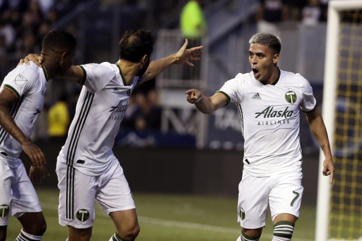 Portland Timbers’ Brian Fernandez, right, reacts after scoring a goal during the first half of an MLS soccer match against the Philadelphia Union in Chester, Pa., Saturday, May 25, 2019.