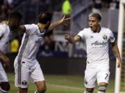 Portland Timbers’ Brian Fernandez, right, reacts after scoring a goal during the first half of an MLS soccer match against the Philadelphia Union in Chester, Pa., Saturday, May 25, 2019.