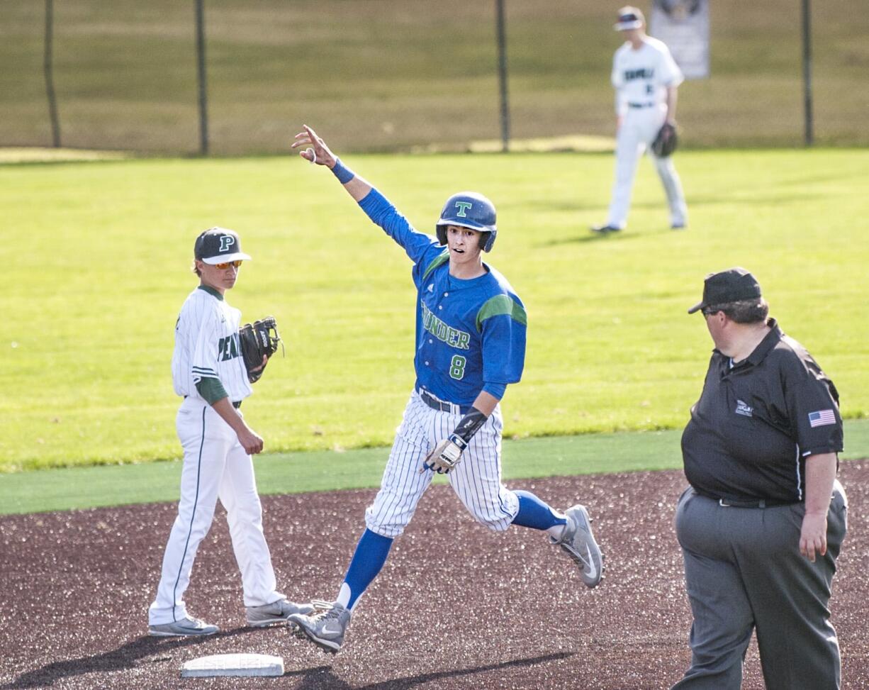 Mountain View's Quinn Rooks rounds second base after hitting a two-run home run in an 8-3 win over Peninsula in the 3A bi-district tournament Saturday at Propstra Stadium.