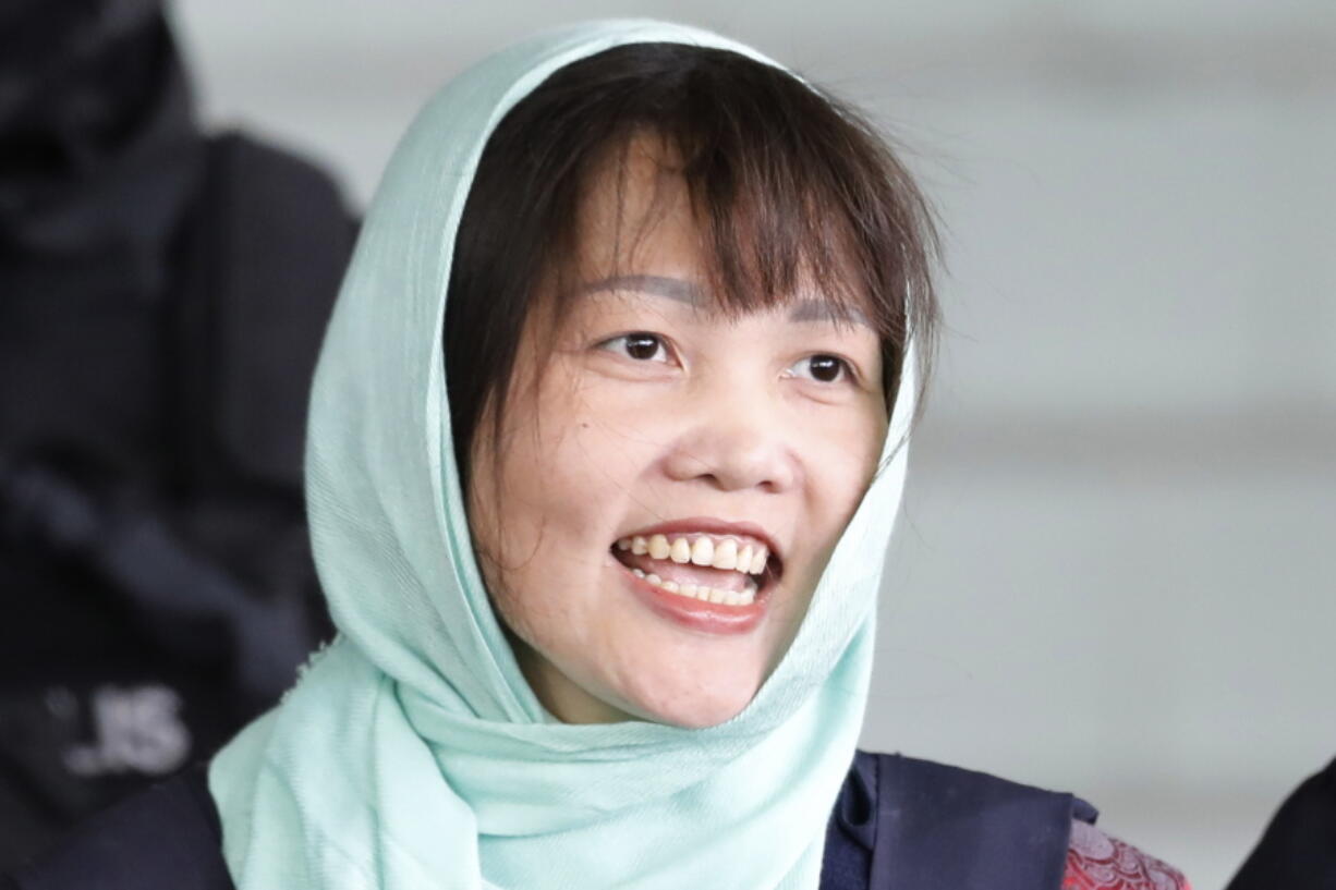 FILE - In this April 1, 2019, file photo, Vietnamese Doan Thi Huong leaves Shah Alam High Court in Shah Alam, Malaysia. A Vietnamese embassy translator says the Vietnamese woman who was tried for the killing of the estranged half brother of North Korea’s leader has been released from a Malaysian prison. Maridam Yacfar told reporters at the prison Friday, May 3, 2019, that Doan Thi Huong looked “happy” but couldn’t give further details.