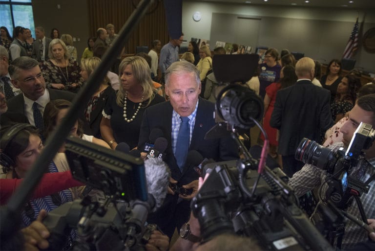 Washington Governor Jay Inslee speaks with the media following his signing of HB 1638 at Vancouver City Hall on Friday, May 10, 2019.