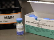 A vial of a measles, mumps and rubella vaccine at a clinic on Vashon Island.