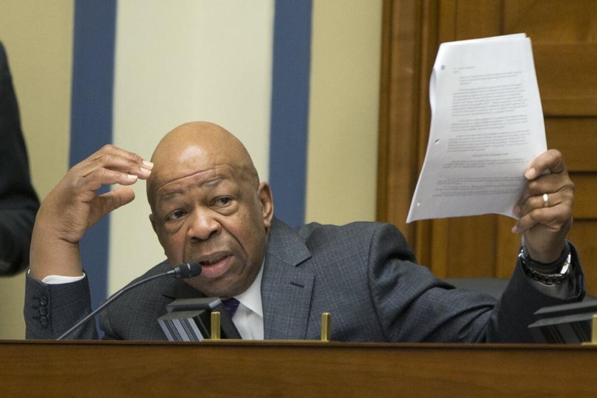 FILE - In this Thursday, Feb. 6, 2014 file photo, Rep. Elijah E. Cummings, D-Md., participates at the House subcommittee hearing on Capitol Hill in Washington, to investigate the Justice Department’s investigation into the IRS abuse scandal. On Friday, May 3, 2019, The Associated Press has found that stories circulating on the internet that Cummings wrote a bill to keep Obama’s records sealed, but he insists that Congress must see all of President Trump’s financial records, are untrue. The Presidential and Federal Records Act Amendments of 2014 gives current and former presidents 60 days to review their records after being notified that they will be made public in the National Archives.