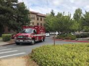 An ambulance leaves Western State Hospital on Aug. 30, 2019, in Lakewood. It is the state’s largest psychiatric hospital.