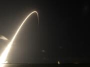 A Falcon 9 SpaceX rocket, with a payload of 60 satellites for SpaceX’s Starlink broadband network, lifts off from Space Launch Complex 40 during a time exposure at the Cape Canaveral Air Force Station in Cape Canaveral, Fla., Thursday, May 23, 2019.