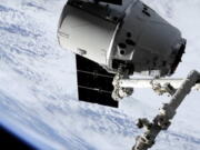 In this image taken from NASA Television, a SpaceX shipment prepares to arrive at the International Space Station following a weekend launch, Monday, May 6, 2019. The Dragon capsule reached the orbiting complex Monday, delivering 5,500 pounds (2,500 kilograms) of equipment and experiments.