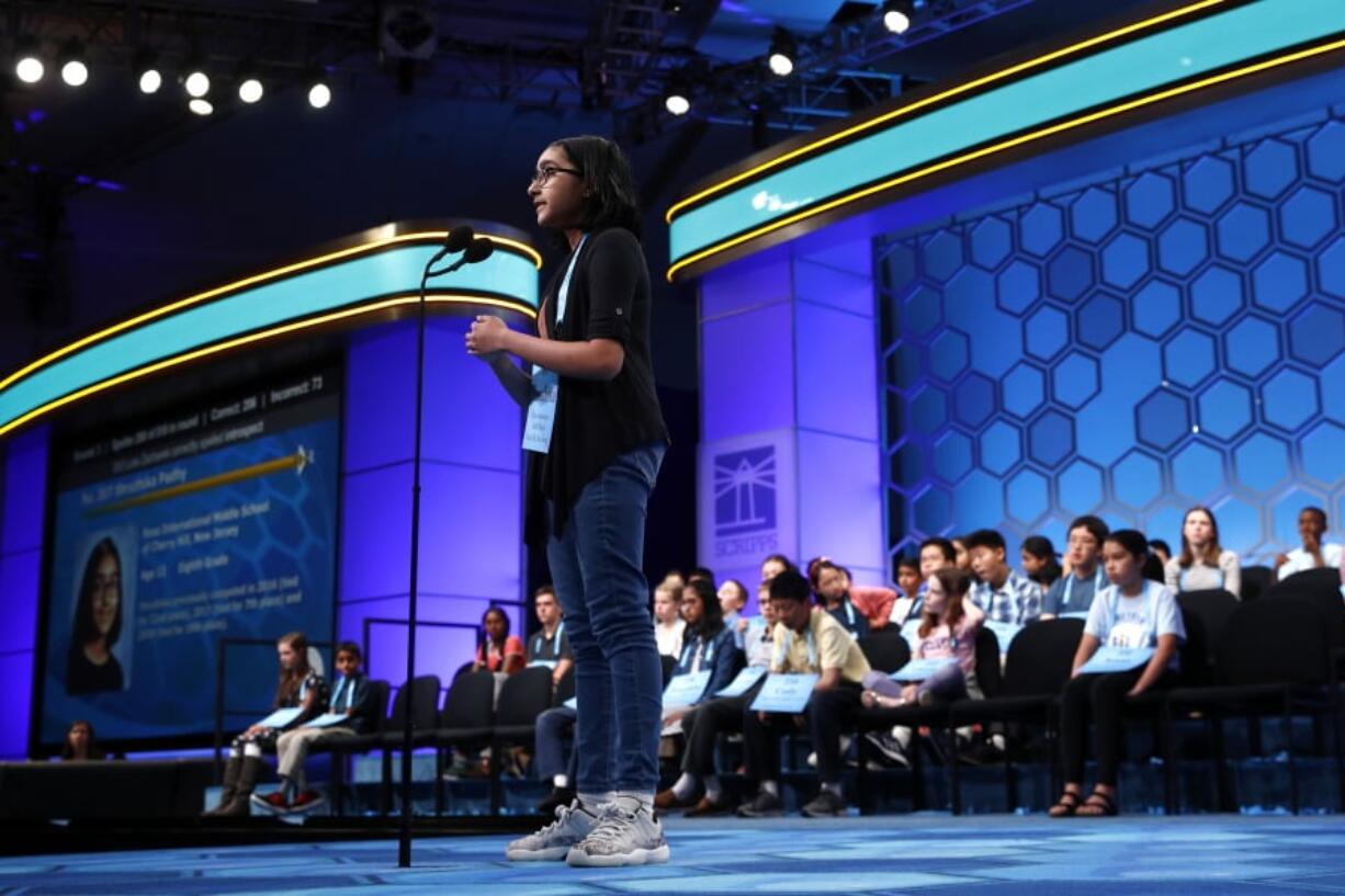 Shruthika Padhy, 13, of Cherry Hill, N.J., competes in the third round of the Scripps National Spelling Bee, Wednesday, May 29, 2019, in Oxon Hill, Md.