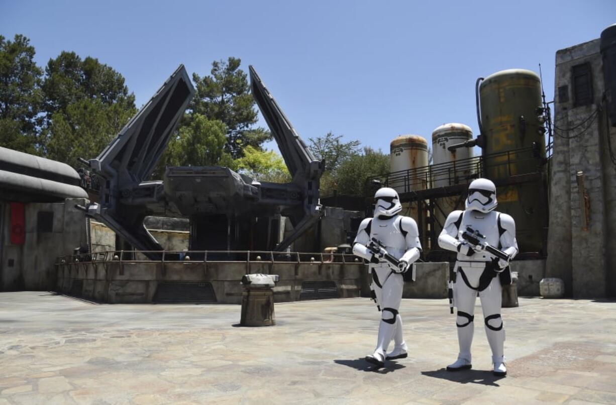 Stormtroopers patrol the Tie Echelon Stage during the Star Wars: Galaxy’s Edge Media Preview on Wednesday at Disneyland Park in Anaheim, Calif.