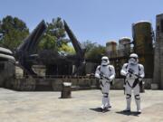 Stormtroopers patrol the Tie Echelon Stage during the Star Wars: Galaxy’s Edge Media Preview on Wednesday at Disneyland Park in Anaheim, Calif.