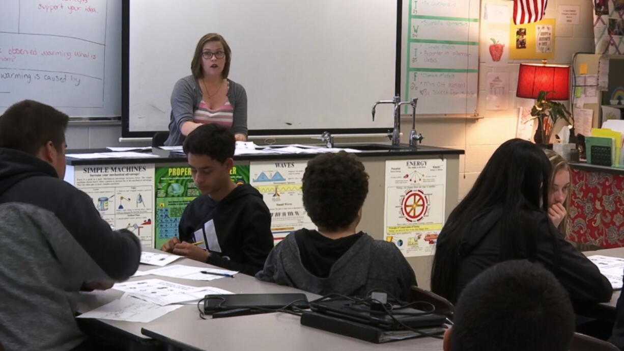 In this April 25, 2019, photo, science teacher Sarah Ott speaks to her class about climate literacy in Dalton, Ga. Teachers across the country describe struggles finding trustworthy materials to help them teach their students about climate change.