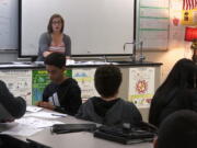 In this April 25, 2019, photo, science teacher Sarah Ott speaks to her class about climate literacy in Dalton, Ga. Teachers across the country describe struggles finding trustworthy materials to help them teach their students about climate change.