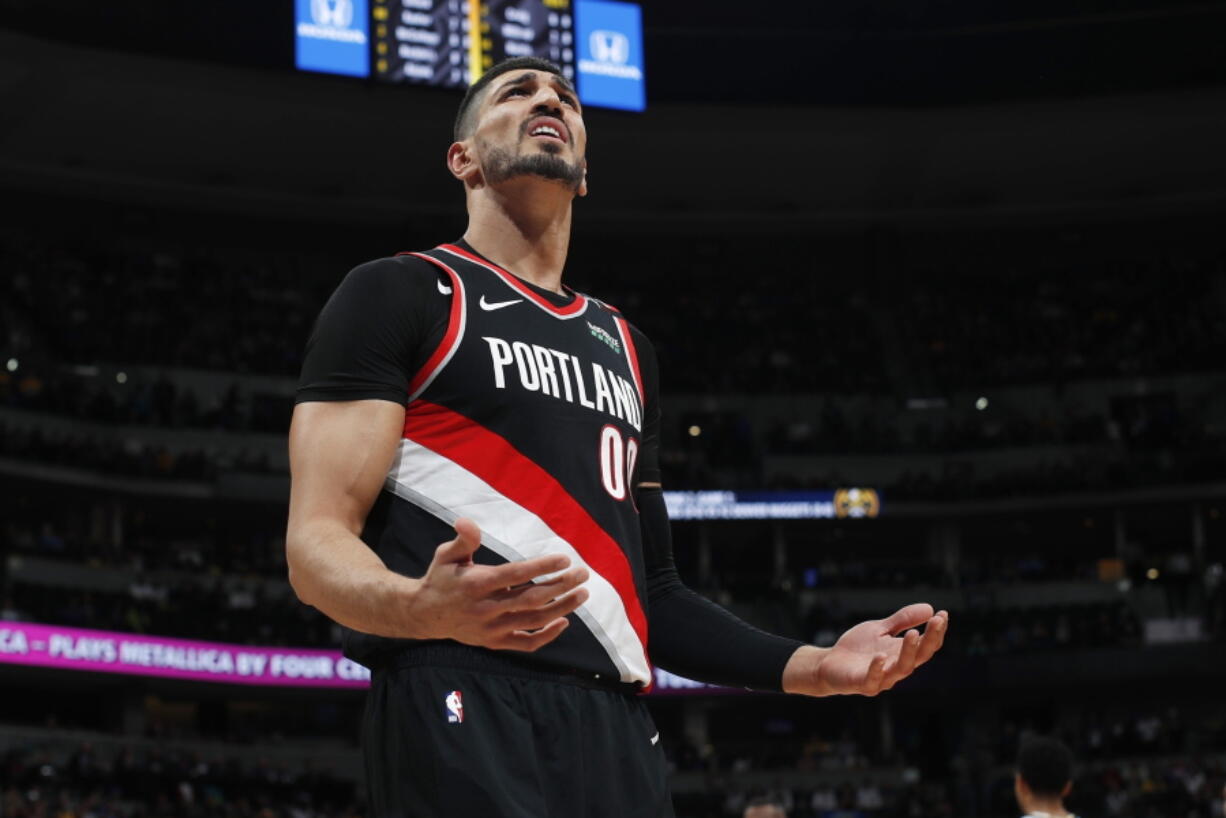 Portland Trail Blazers center Enes Kanter reacts after being called for a foul against the Denver Nuggets in the first half of Game 1 of an NBA basketball second-round playoff series Monday, April 29, 2019, in Denver.