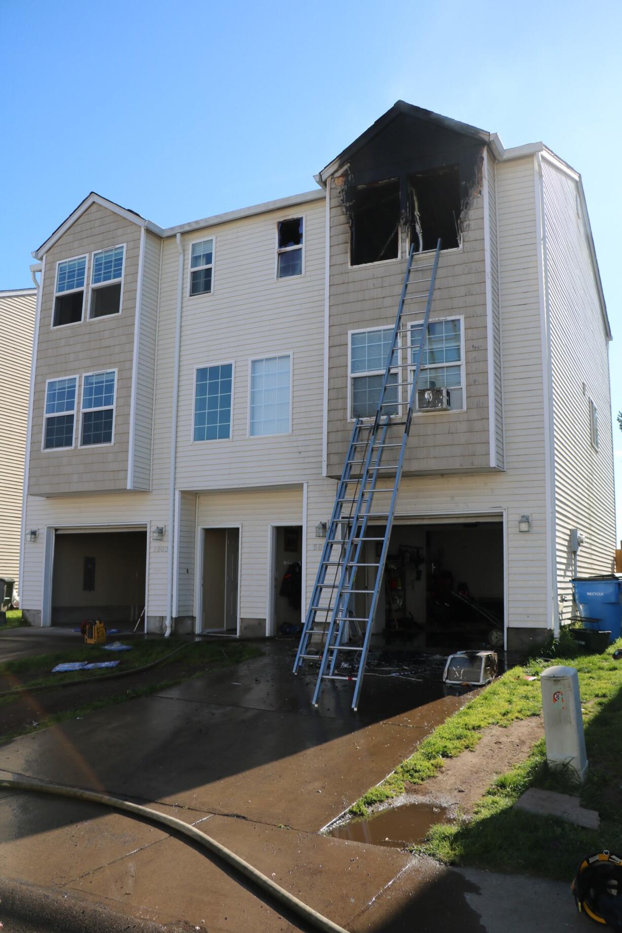 A fire severely damaged this three-story duplex in the North Image neighborhood Wednesday morning.