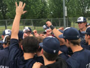 Skyview's baseball team celebrates its 1-0 regional-final win over Eastlake in Puyallup to advance to next week's state semifinals. The Storm won a pair of 1-0 games Saturday.