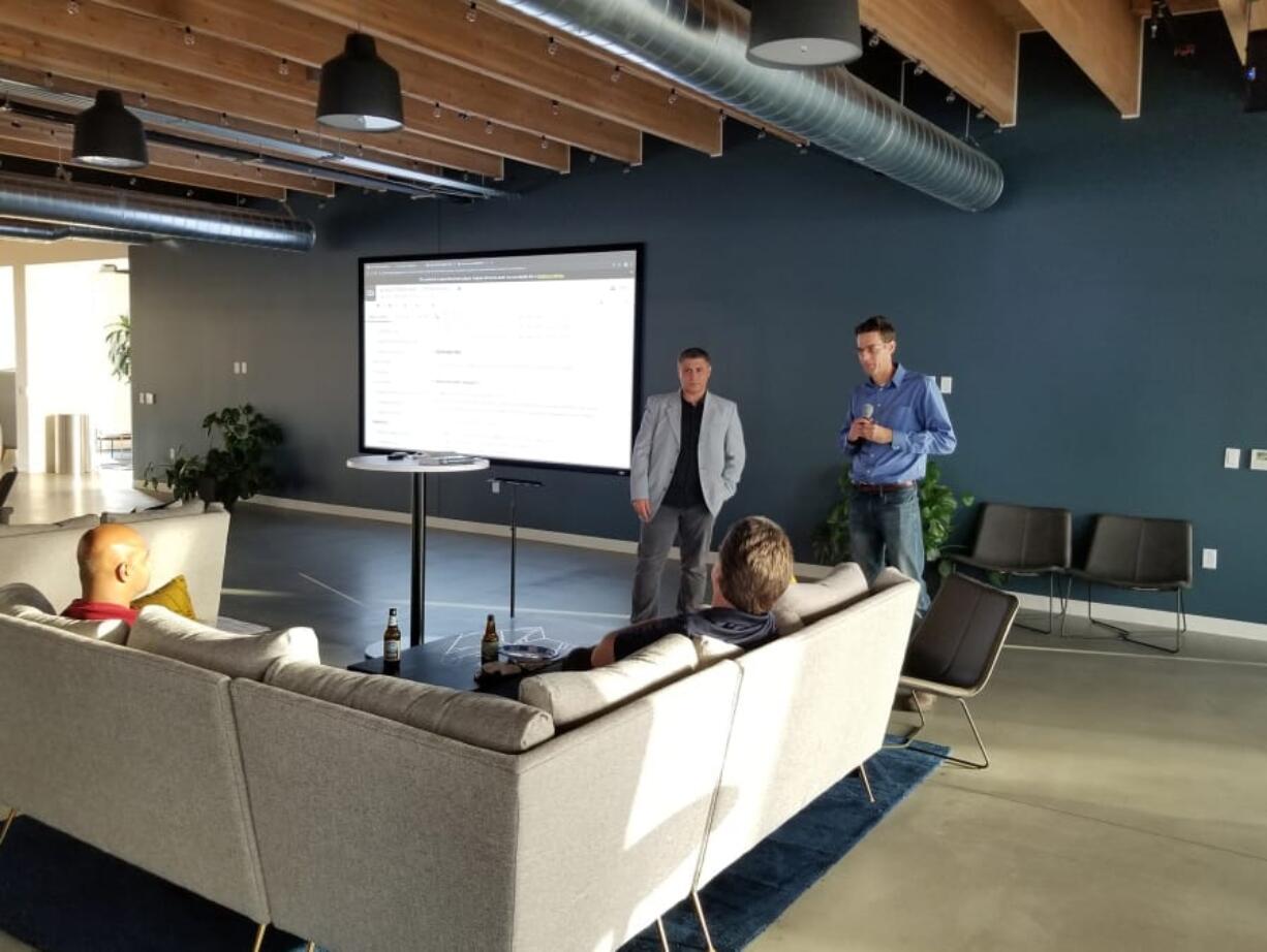 Manceps CEO Al Kari, left, and senior NLP architect Hobson Lane lead a demonstration to see if artificial intelligence could be used to decipher the redacted portions of the Mueller Report.
