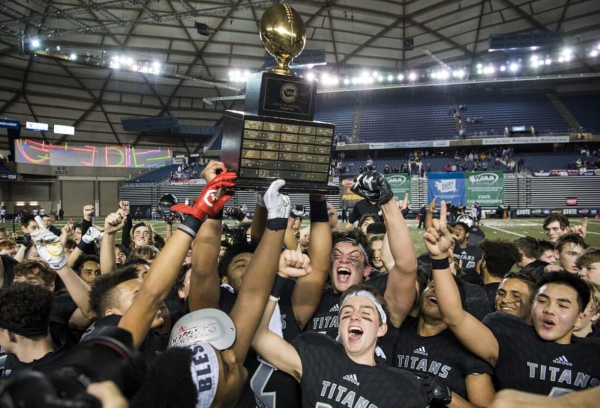 Union celebrates its win over Lake Stevens for the Class 4A state title on Dec. 1, 2018, in Tacoma. That game will be the last state championship football game in the Tacoma Dome for the forseeable future after the WIAA voted to find different venues for the games.