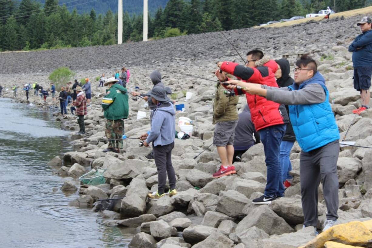 Shad anglers line up below Bonneville Dam. Shad fishing has been excellent in the Columbia River this year.