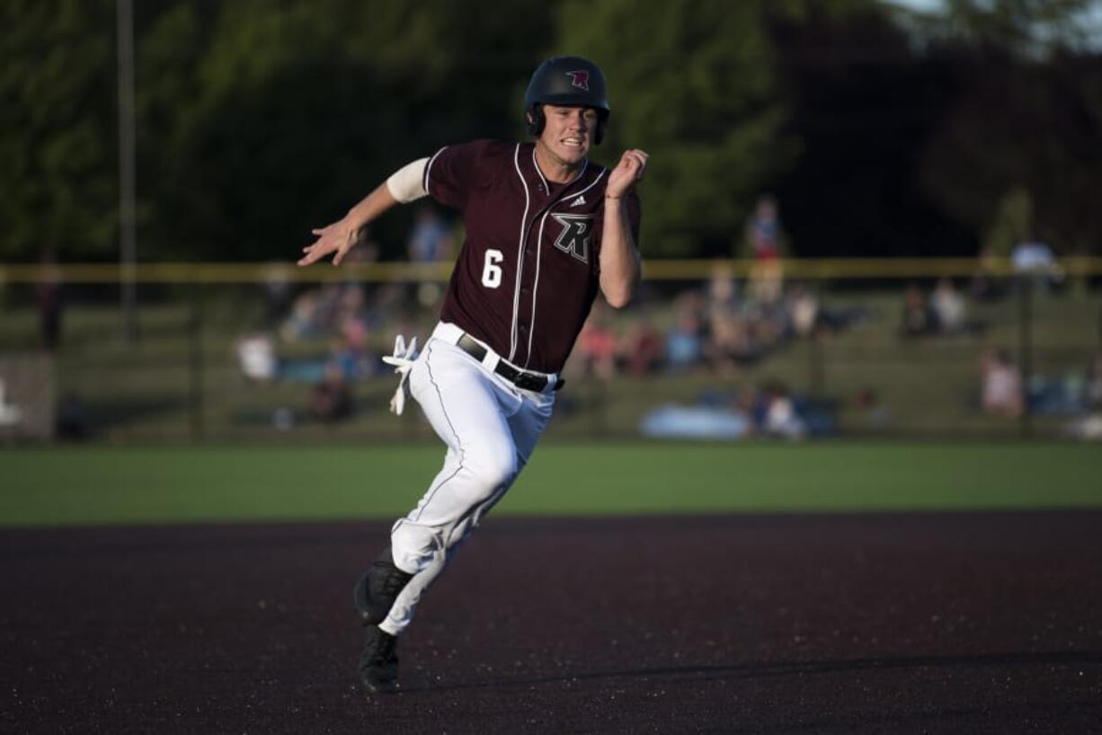 Ridgefield's Cameron Repetti rounds third base to score against in the season opener on Tuesday. Repetti delivered Ridgefield first franchise win with a two-run home run in the eighth inning on Thursday.