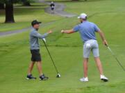 Daniel Snoey of Camas, left, and Spencer Tibbits of Vancouver congratulate each other at Saturday's final at the Oregon Amateur (Oregon Golf Association photo).